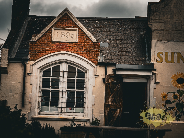 The Victorian brick front of the Old Village School of Ore