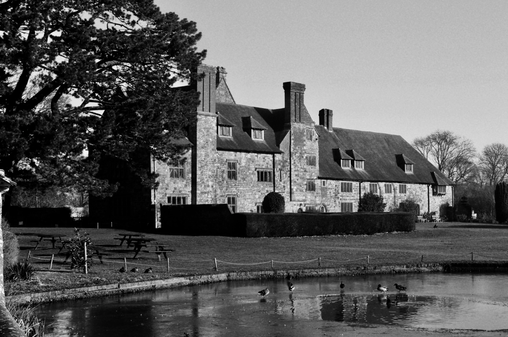 Michelham Priory, a stone manor house across its moat